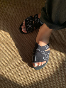 BLACK ON BLACK LOGO SLIDE