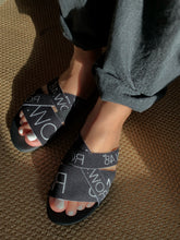 BLACK ON BLACK LOGO SLIDE